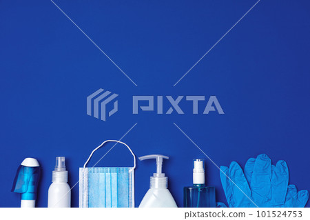 Row of antibacterial protective tools including face mask, gloves, soap and sanitizing gel 101524753