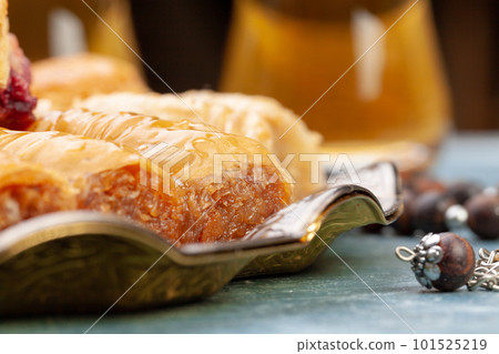 Plate of baklava dessert close up served on table Plate of baklava dessert close up served on table 101525219