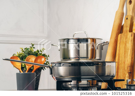 Clean saucepan on a gas stove in kitchen 101525316