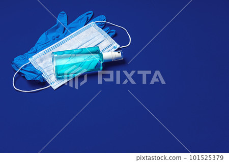 Face mask, medical gloves and sanitizer. Coronavirus prevention concept Face mask, medical gloves and sanitizer. Coronavirus prevention concept 101525379