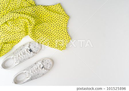 Flat lay of woman summer outfit on white background Flat lay of woman summer outfit on white background 101525896