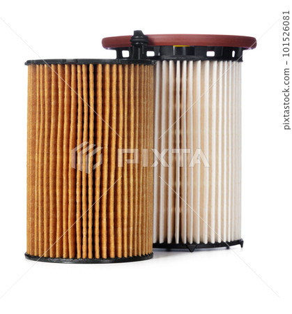 Car oil filters isolated on white, close up. Car oil filters isolated on white, close up. 101526081