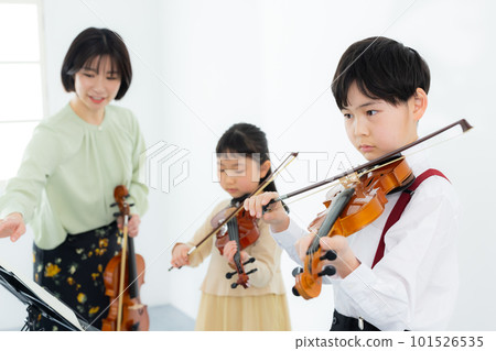 A child playing the violin A child playing the violin 101526535