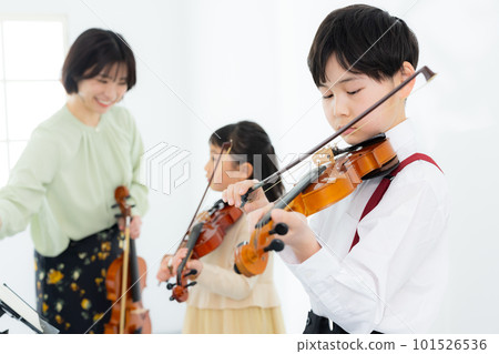 A child playing the violin A child playing the violin 101526536
