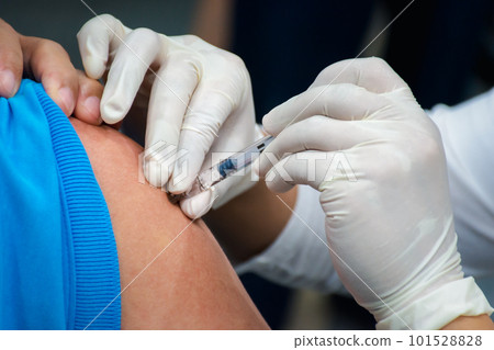 Patient asian woman get vaccinated the flu covid19 101528828