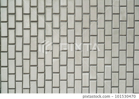Brown mosaic tile wall background 101530470