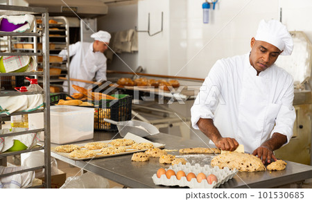 Making sweet buns and eggs in bakery kitchen Making sweet buns and eggs in bakery kitchen 101530685