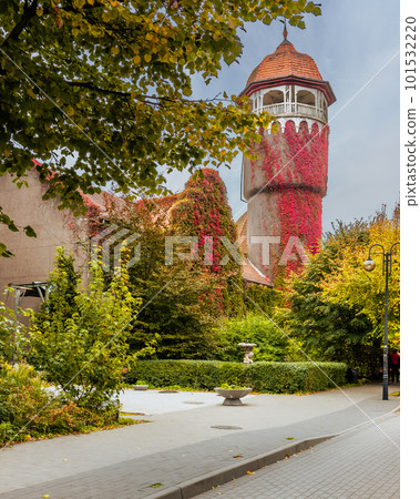 Old water tower, one of the symbols of the city Svetlogorsk at autumn. Russia Old water tower, one of the symbols of the city Svetlogorsk at autumn. Russia 101532220
