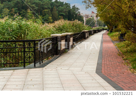 Embankment of Lake Tikhoe in autumn day. Svetlogorsk. Russia Embankment of Lake Tikhoe in autumn day. Svetlogorsk. Russia 101532221