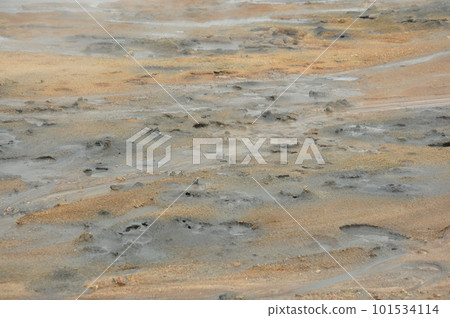 Moon crater-like landscape in sulfurous hot springs in Hverir, Iceland 101534114