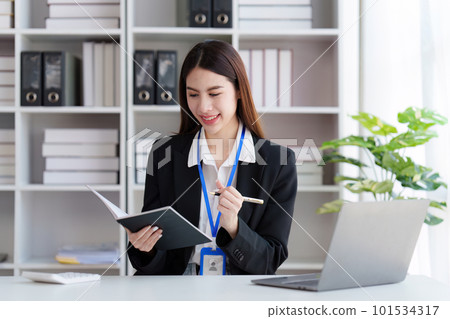 Accountant asian business person analysis finance document, tax, exchange, accounting and Financial advisor concept Accountant asian business person analysis finance document, tax, exchange, accounting and Financial advisor concept 101534317