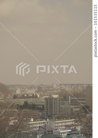 Cityscape foggy with yellow sand 101535115