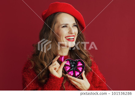happy elegant woman in red sweater and beret happy elegant woman in red sweater and beret 101536286