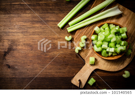 Sliced fresh celery on a cutting board. Sliced fresh celery on a cutting board. 101540565