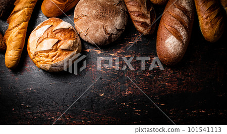 Different types of fresh crispy bread. 101541113