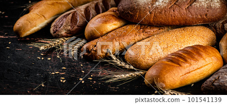 A variety of delicious bread on the table. 101541139