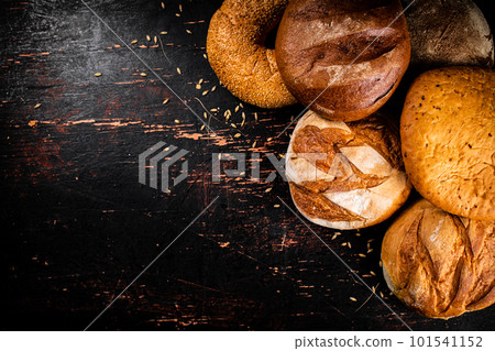 A variety of delicious bread on the table. 101541152