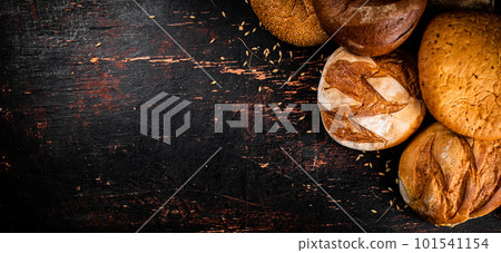 A variety of delicious bread on the table. 101541154