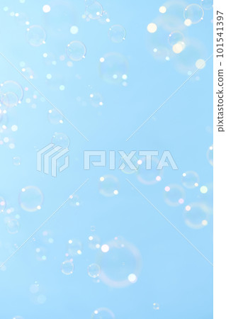 Soap bubbles dancing in the blue sky 101541397