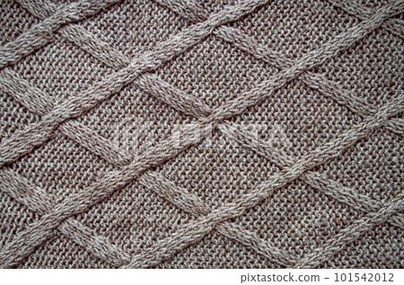 Handmade knitted background with macro weave threads. 101542012