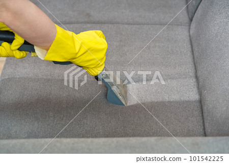 Textile sofa chemical cleaning with professionally extraction method. Upholstered furniture. 101542225