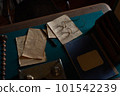 Vintage letters, glasses, pen and inkwell on a wooden table 101542239