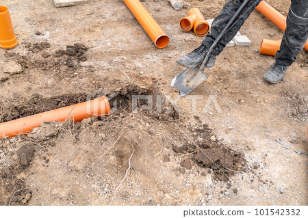 plastic pvc waste sewer pipe in the ground. construction site 101542332
