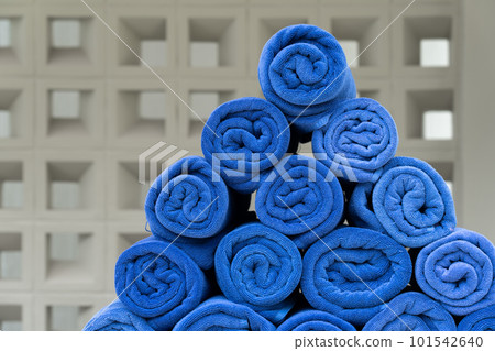 Rolled up blue spa towels Rolled up blue spa towels 101542640