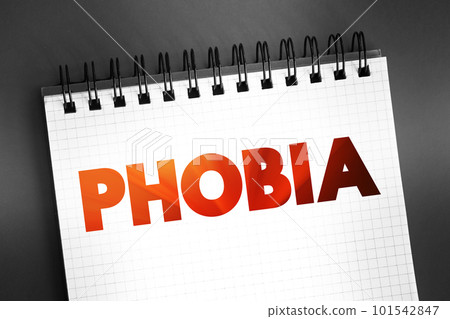Phobia - anxiety disorder defined by a persistent and excessive fear of an object or situation, text on notepad, concept background Phobia - anxiety disorder defined by a persistent and excessive fear of an object or situation, text on notepad, concept background 101542847