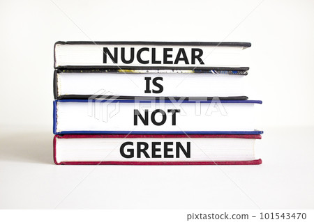 Nuclear is not green symbol. Concept words Nuclear is not green on books. Beautiful white table white background. Nuclear is not green business concept. Copy space. 101543470