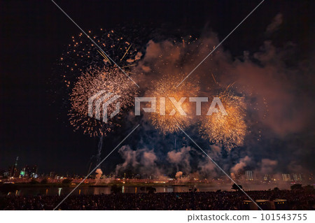 Fireworks display in Adachi Ward seen from the Arakawa riverbed, Tokyo Fireworks display in Adachi Ward seen from the Arakawa riverbed, Tokyo 101543755