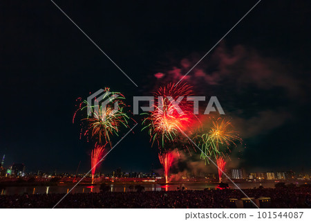 Fireworks display in Adachi Ward seen from the Arakawa riverbed, Tokyo Fireworks display in Adachi Ward seen from the Arakawa riverbed, Tokyo 101544087
