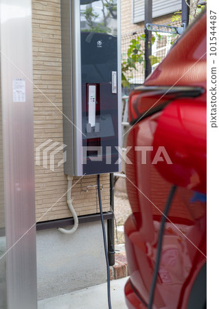Charging a red PHEV car 101544487