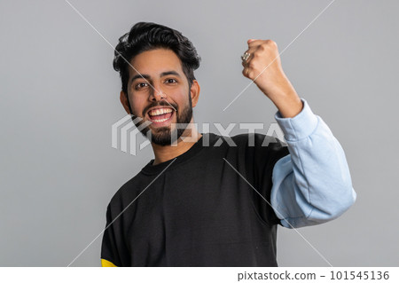 Happy indian man celebrating success, winning, birthday, lottery jackpot goal achievemen, good news Happy indian man celebrating success, winning, birthday, lottery jackpot goal achievemen, good news 101545136