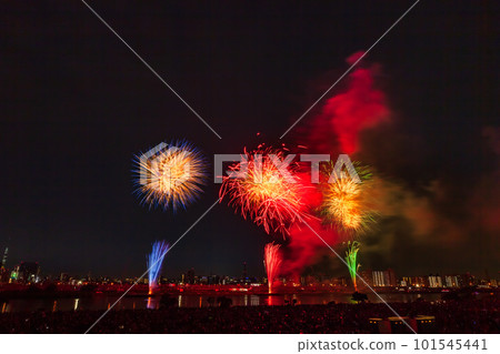 Fireworks display in Adachi Ward seen from the Arakawa riverbed, Tokyo 101545441