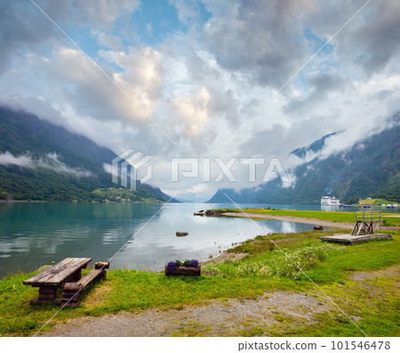 Lustrafjorden fjord and mountains summer cloudy landscape, Norway. 101546478