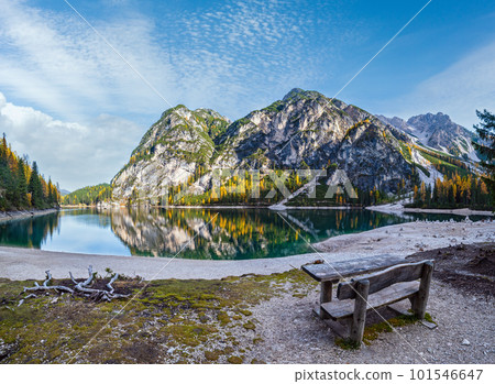 Autumn peaceful alpine lake Braies or Pragser Wildsee. Fanes-Sennes-Prags national park, South Tyrol, Dolomites Alps, Italy, Europe. Picturesque traveling, seasonal and nature beauty concept scene. Autumn peaceful alpine lake Braies or Pragser Wildsee. Fanes-Sennes-Prags national park, South Tyrol, Dolomites Alps, Italy, Europe. Picturesque traveling, seasonal and nature beauty concept scene. 101546647