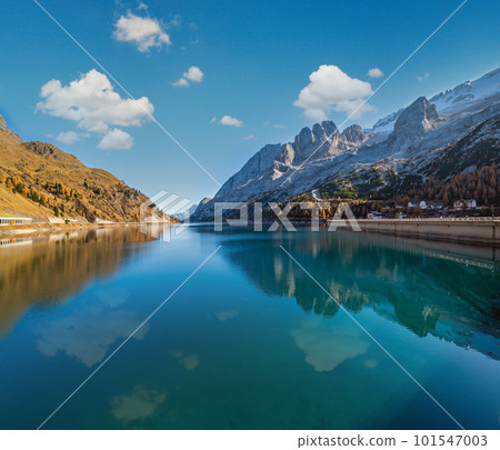 Autumn alpine mountain Lake and Pass, Trentino, Dolomites Alps, Italy. Autumn alpine mountain Lake and Pass, Trentino, Dolomites Alps, Italy. 101547003