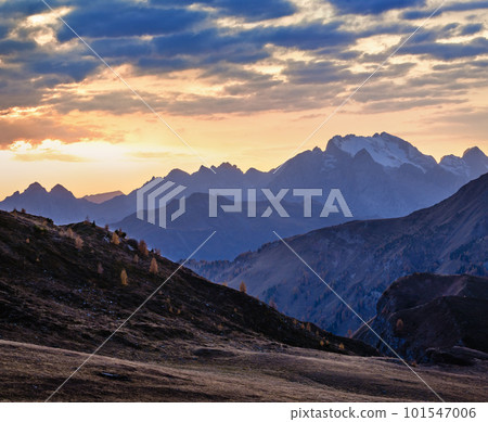 Mountain evening dusk peaceful hazy view from Giau Pass. 101547006