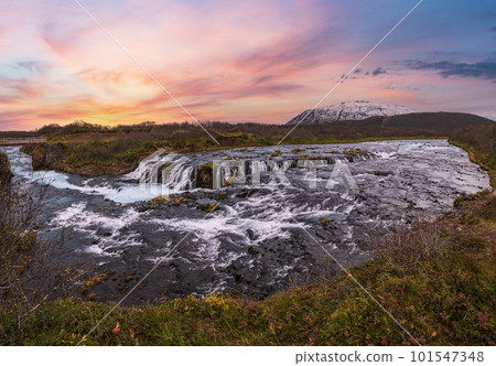 Picturesque waterfall Bruarfoss autumn view. Season changing in southern Highlands of Iceland. Picturesque waterfall Bruarfoss autumn view. Season changing in southern Highlands of Iceland. 101547348