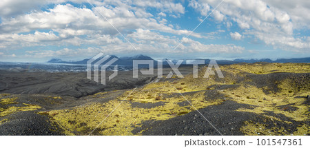 Iceland autumn tundra landscape near Haoldukvisl glacier, Iceland. Glacier tongue slides from the Vatnajokull icecap or Vatna Glacier near subglacial Esjufjoll volcano. Not far from Iceland Ring Road. 101547361