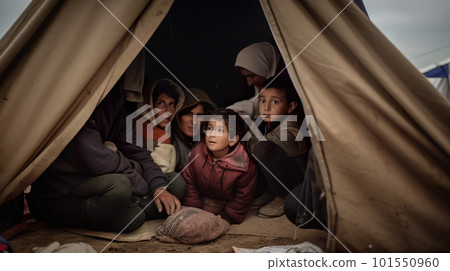 A group of refugee people sitting inside of a tent. AI generative image A group of refugee people sitting inside of a tent. AI generative image 101550960