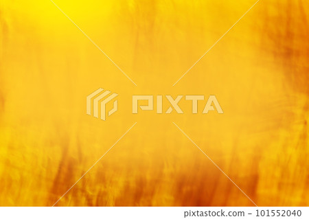 Bokeh defocused honey mead yellow orange color shimmering abstract background 101552040
