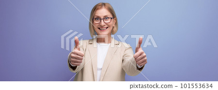 50s business woman in a stylish jacket on a bright studio background with copy space 50s business woman in a stylish jacket on a bright studio background with copy space 101553634