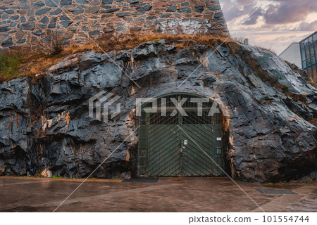Gates to the bunker inside the cliff. Nuclear shelter. 101554744