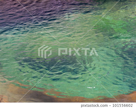 Emerald green clear waterfall basin 101556602