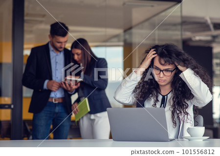 Team work discussing. Young woman with paper folder. Team work discussing. Young woman with paper folder. 101556812