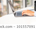 Woman working at home office hand on keyboard close up 101557091
