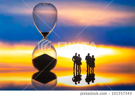 miniature people. silhouettes of different people watching the sunset  101557343