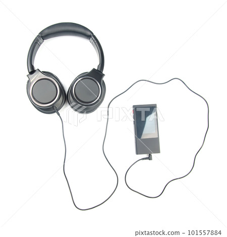 Headphones for listening to music with digital audio player on white background 101557884